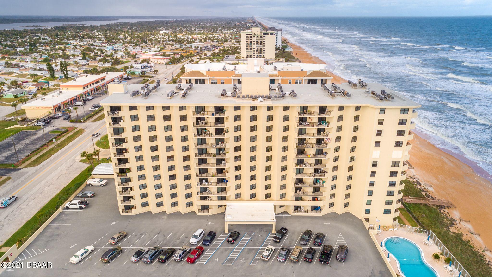 1415 Ocean Shore Boulevard, Unit 903 Ormond Beach, FL 32176 - Photo 28 of 47 a view of a balcony with wooden floor