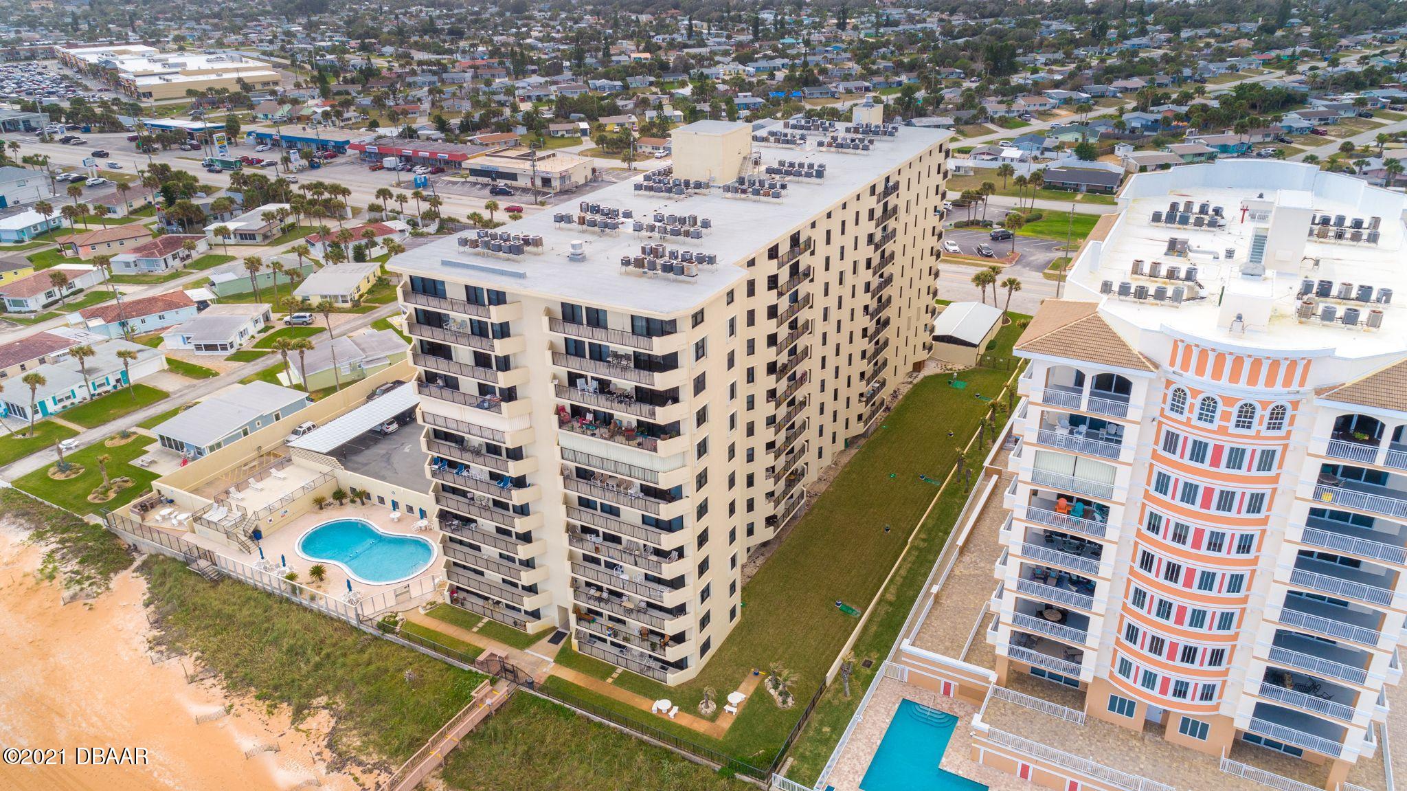 1415 Ocean Shore Boulevard, Unit 903 Ormond Beach, FL 32176 - Photo 31 of 47 a city view with tall buildings