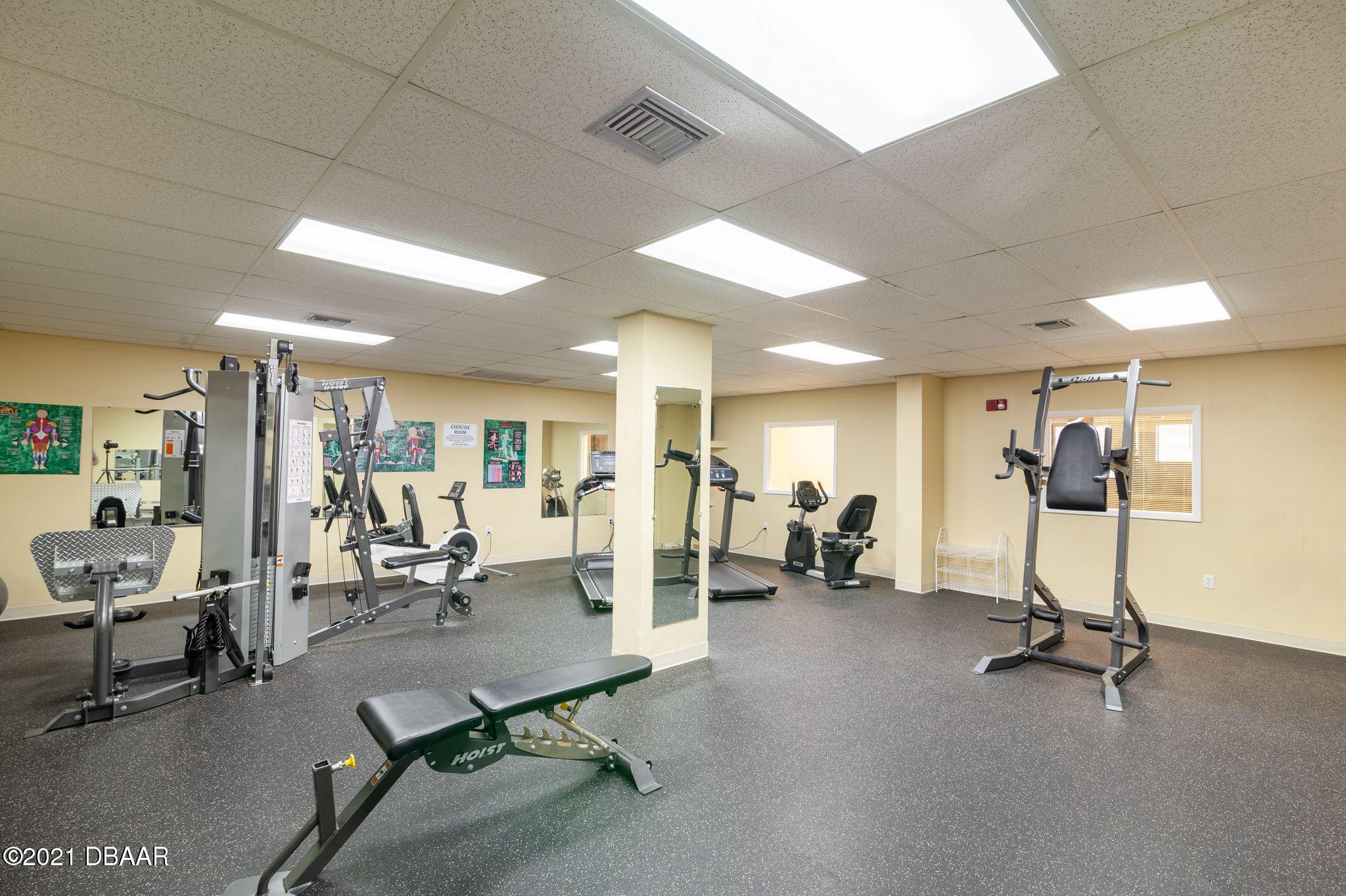1415 Ocean Shore Boulevard, Unit 903 Ormond Beach, FL 32176 - Photo 42 of 47 a view of a room with gym equipment