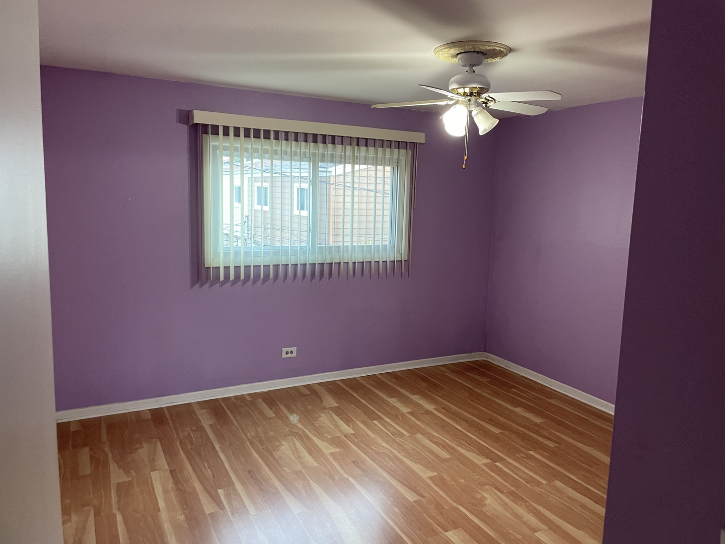 9137 Barberry Lane, Unit 9137 Des Plaines, IL 60016 - Photo 11 of 22 a view of an empty room with a window