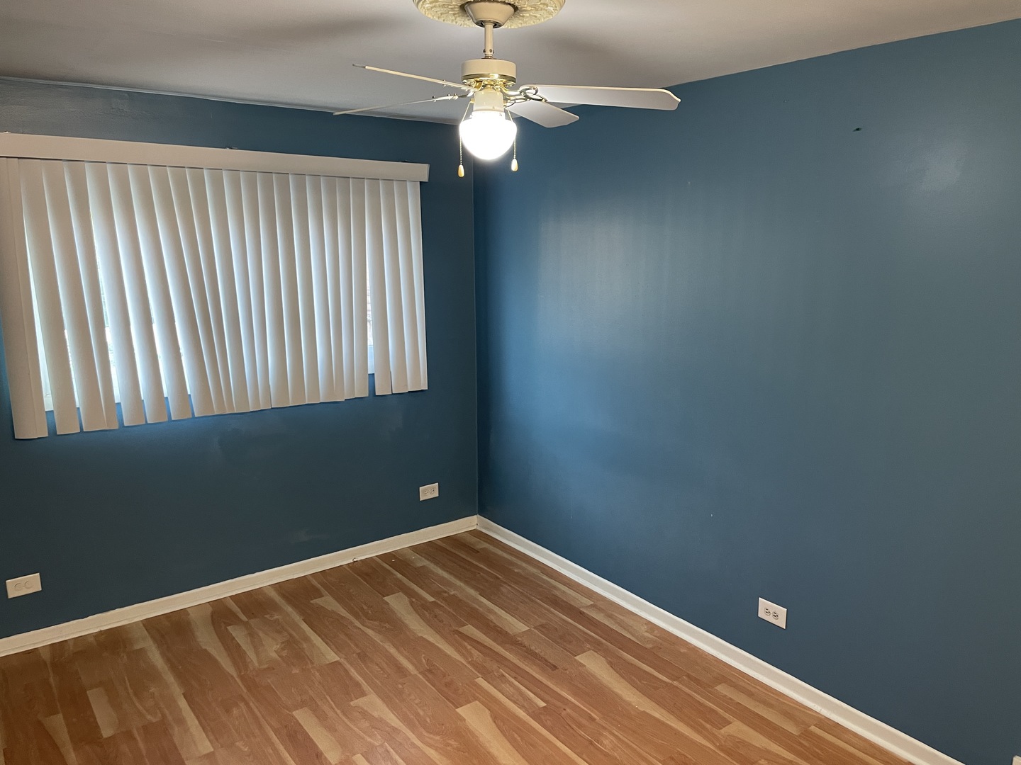 9137 Barberry Lane, Unit 9137 Des Plaines, IL 60016 - Photo 12 of 22 a view of a room with a fan