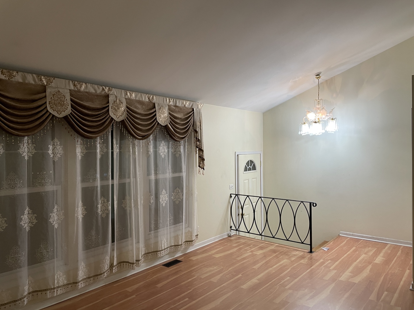 9137 Barberry Lane, Unit 9137 Des Plaines, IL 60016 - Photo 3 of 22 a view of a room with staircase and mirror