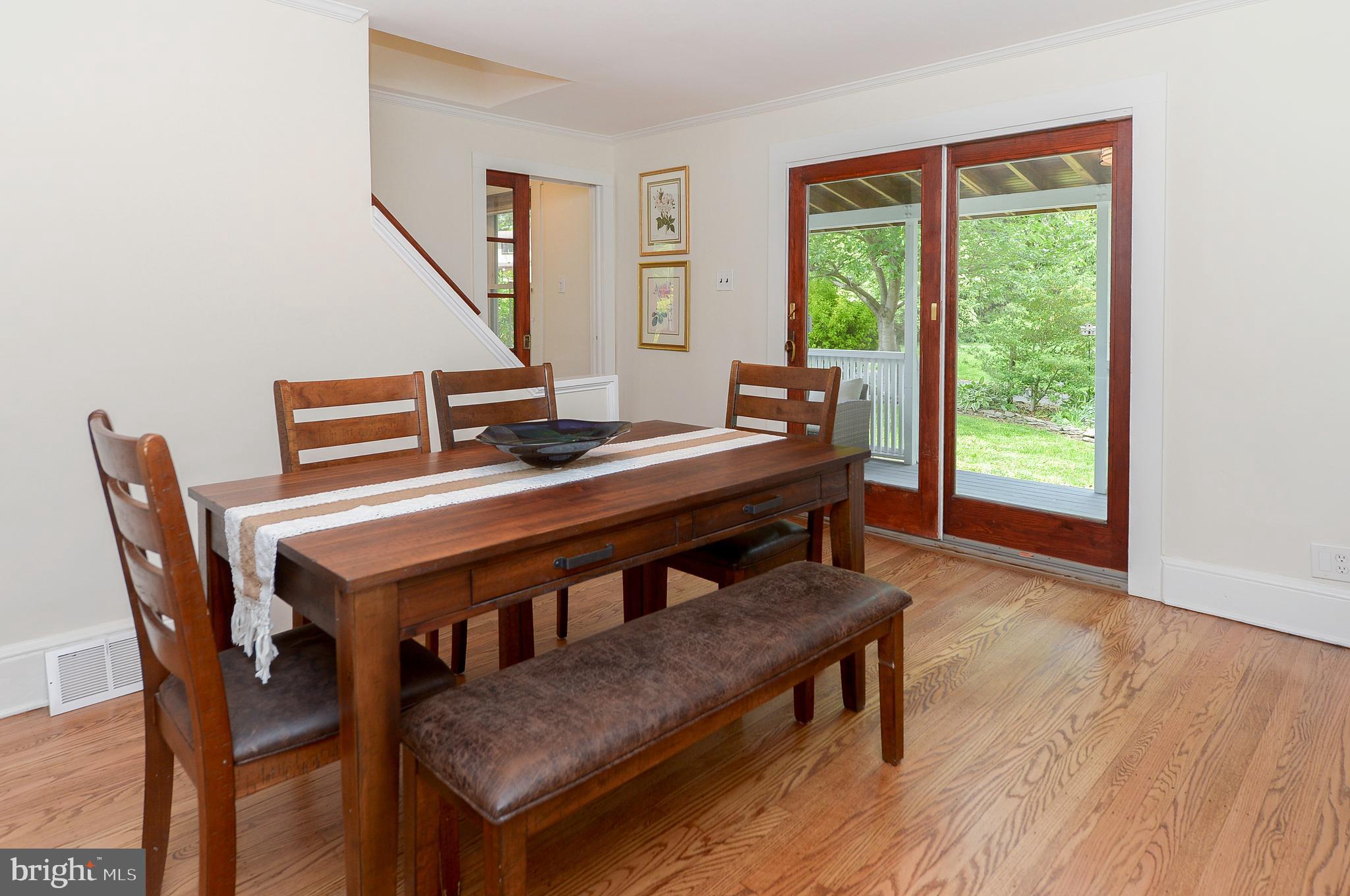 209 Riverview Road Swarthmore, PA 19081 - Photo 19 of 50 Formal Dining Room sliding doors to covered porch