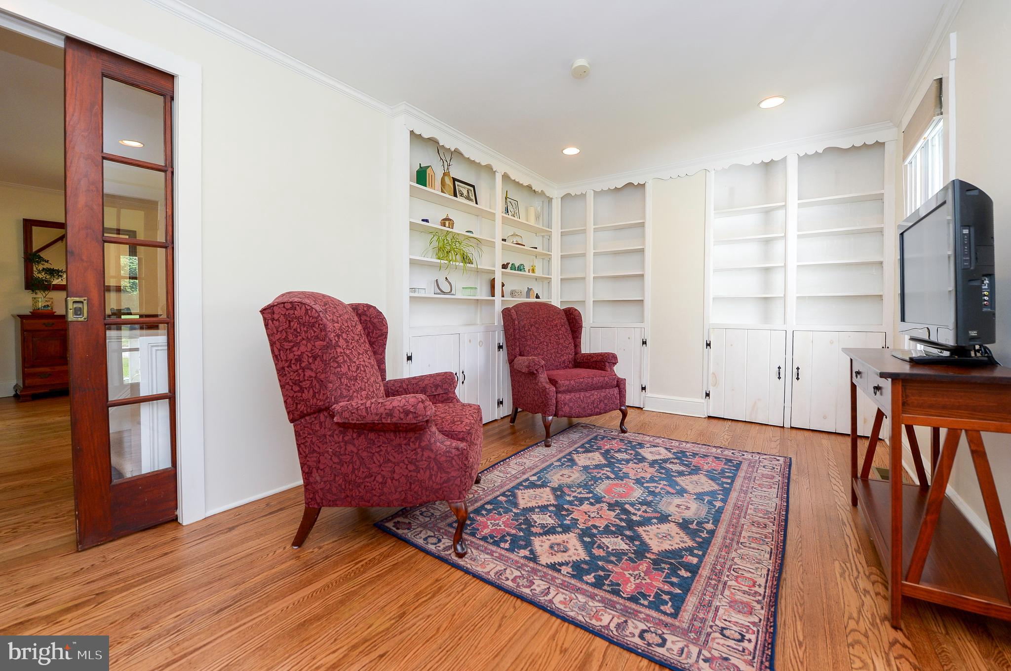 209 Riverview Road Swarthmore, PA 19081 - Photo 21 of 50 Front Living/Sitting Room with pocket door