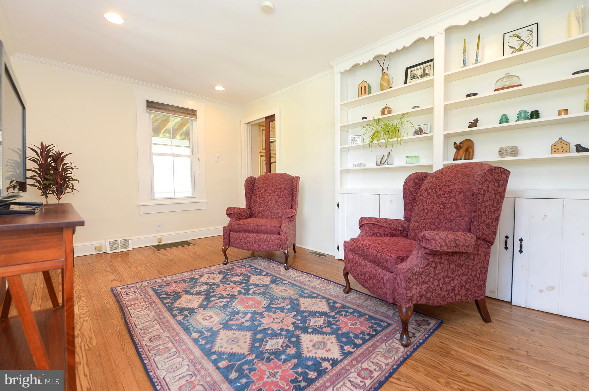 209 Riverview Road Swarthmore, PA 19081 - Photo 22 of 50 Front Living/Sitting Room with built-in bookcases