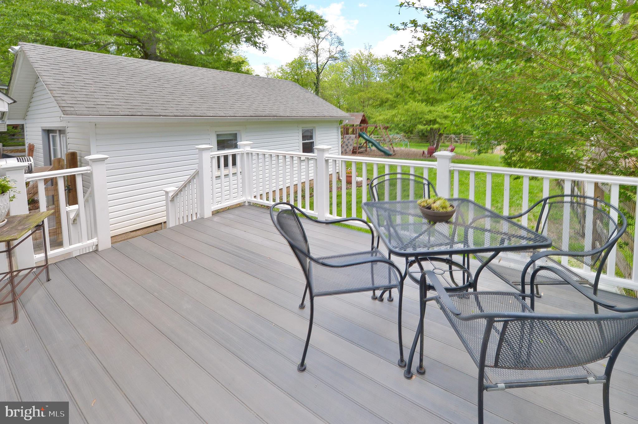 209 Riverview Road Swarthmore, PA 19081 - Photo 36 of 50 Deck off of Breakfast Room & stairs to rear yard