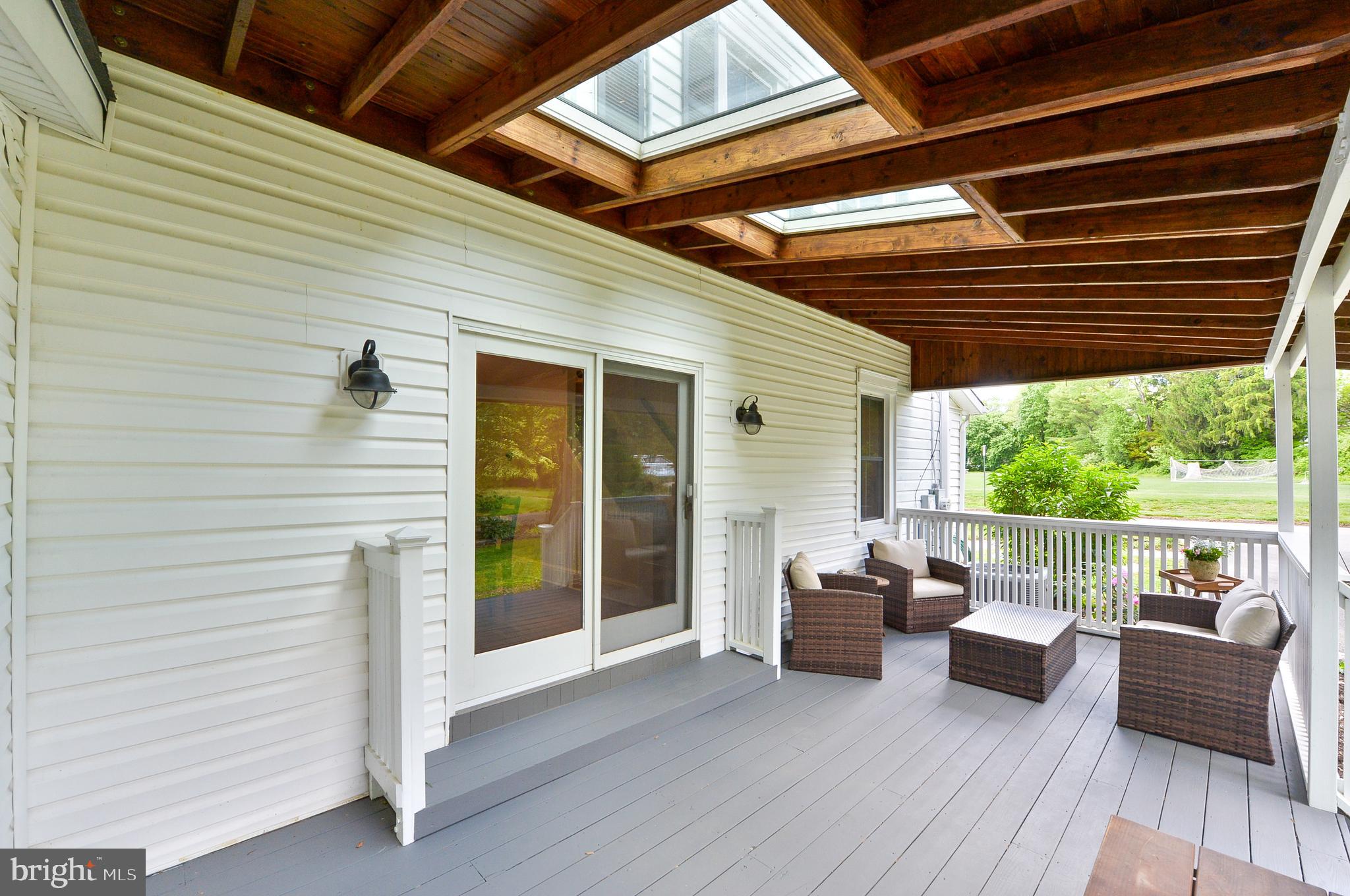 209 Riverview Road Swarthmore, PA 19081 - Photo 4 of 50 Side Porch - Sliding glass doors to Dining Room