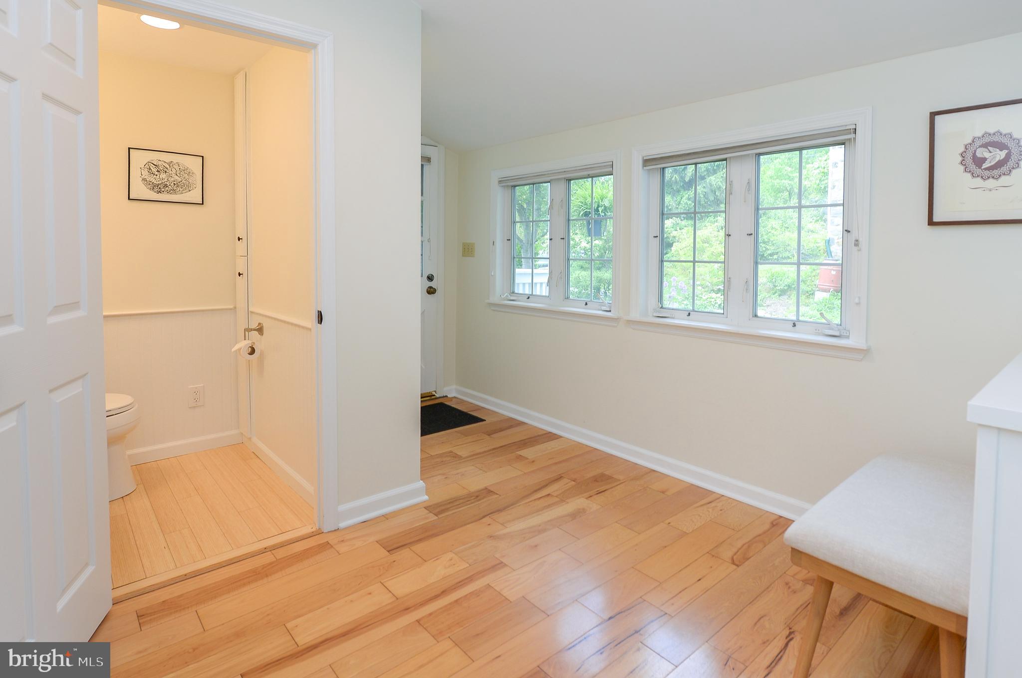 209 Riverview Road Swarthmore, PA 19081 - Photo 8 of 50 Side Entry foyer and Half Bath