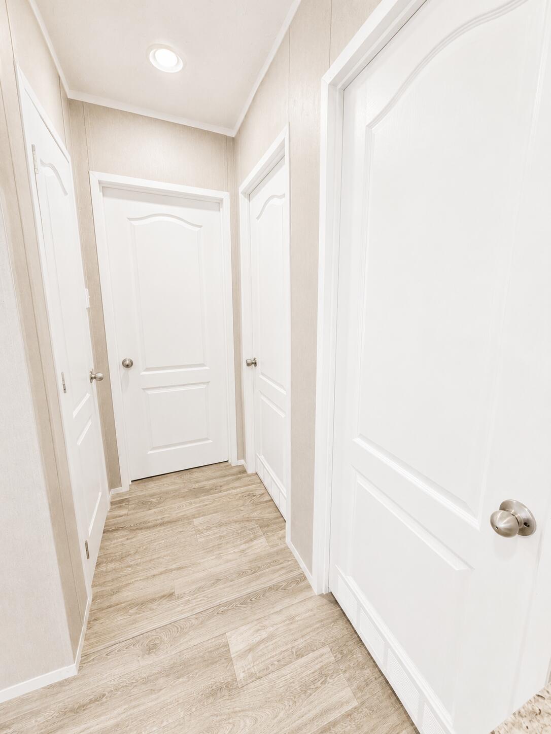 1121 Orange Loop Okeechobee, FL 34974 - Photo 15 of 33 Bright Neutral Hallway with White Panele