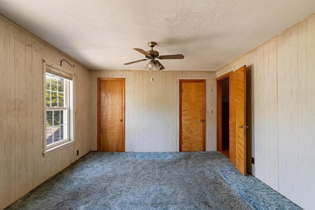 19 Butler Avenue Wakefield, MA 01880 - Photo 25 of 33 a view of a livingroom with a ceiling fan and window