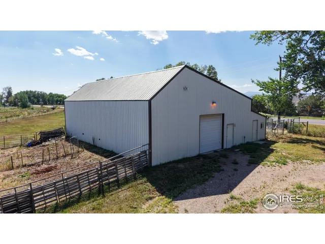 a view of a backyard of the house