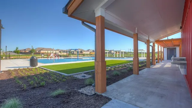 a view of a pathway with a building in the background