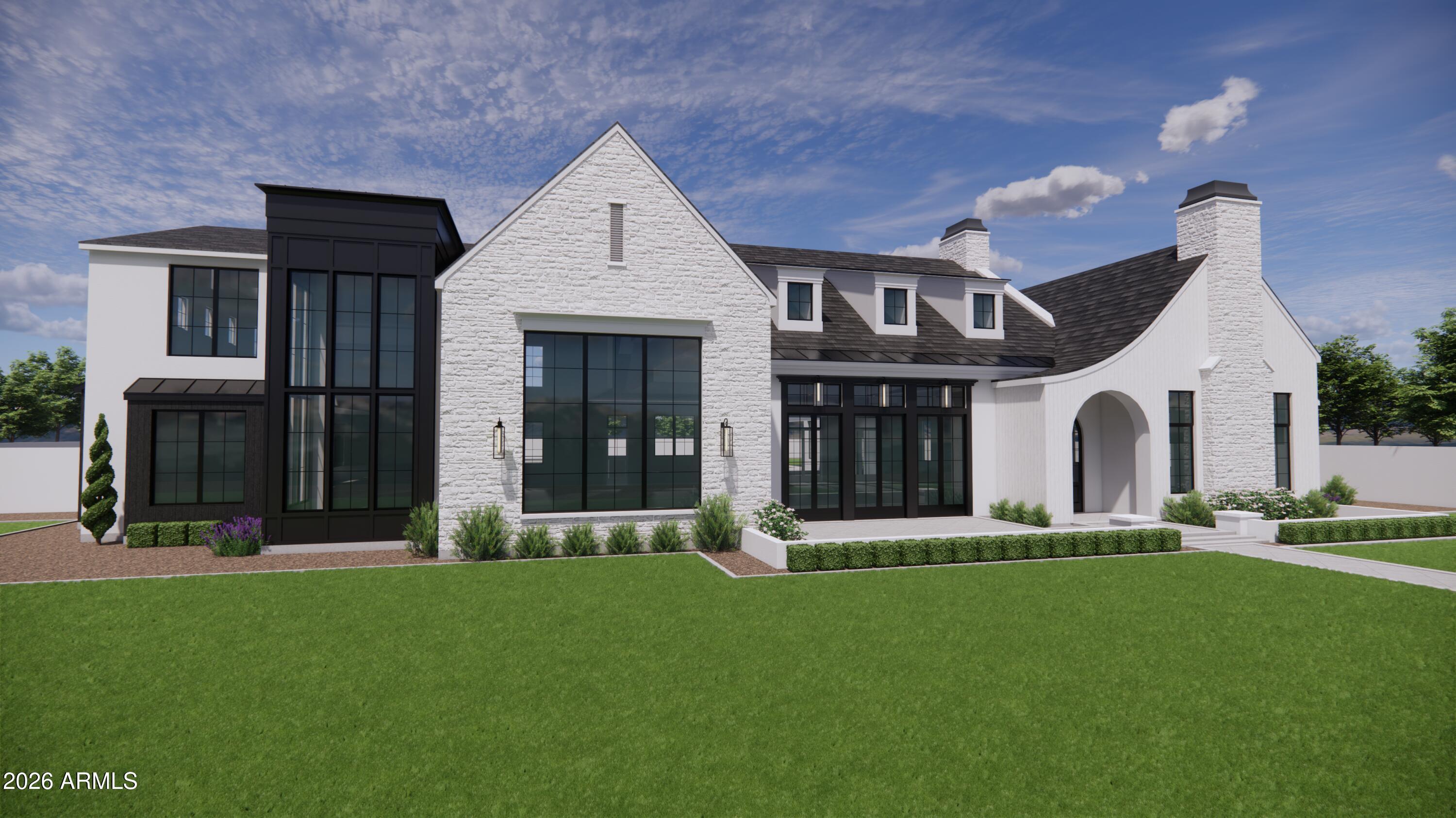 24926 South 182nd Place, Unit 5 Gilbert, AZ 85298 - Photo 3 of 9 a front view of a house with a yard