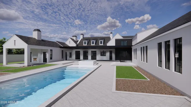 a view of a house with a swimming pool and a yard