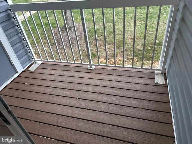 a bathroom with a toilet a sink and shower