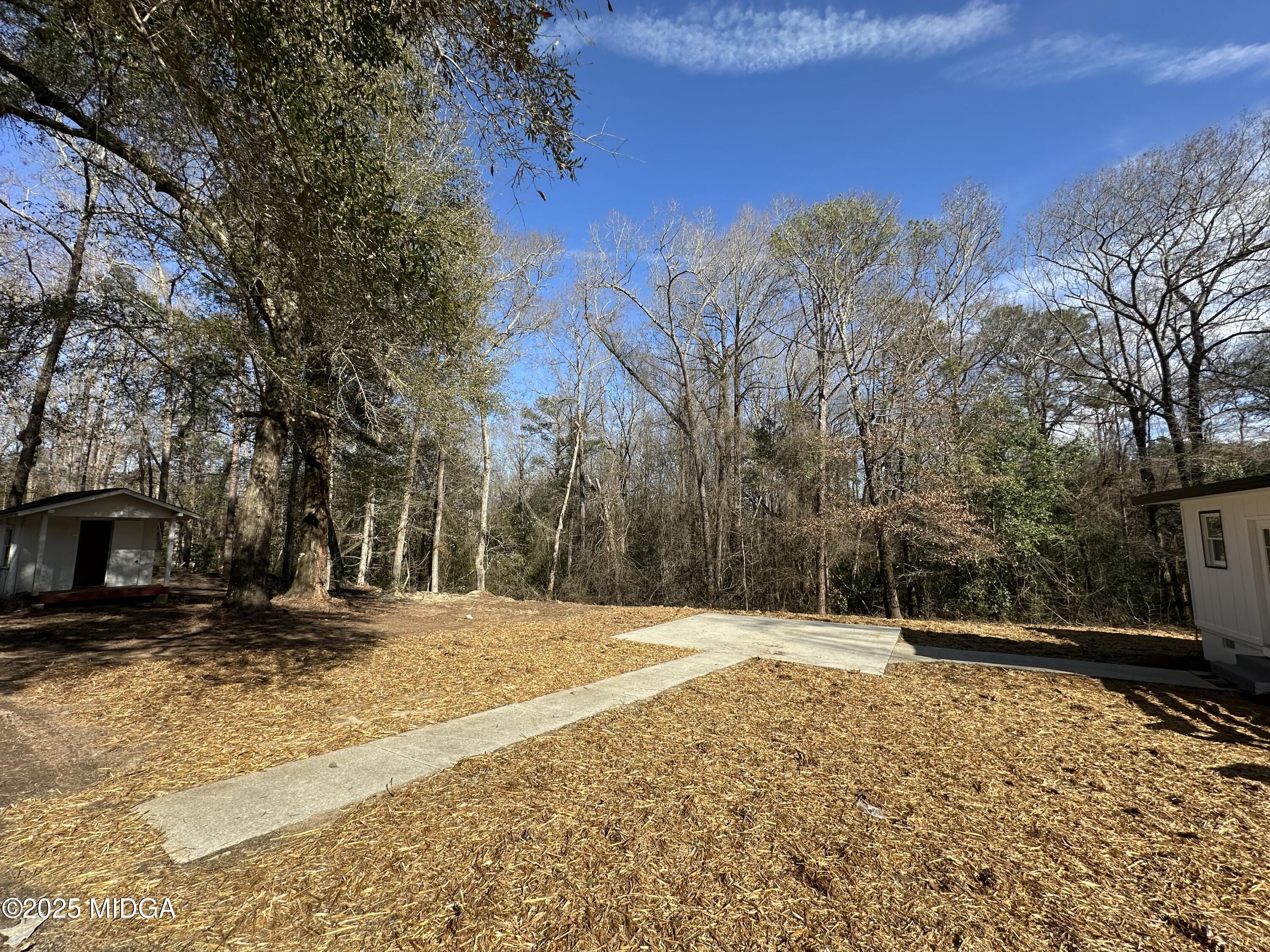 4105 Holley Road Lizella, GA 31052 - Photo 20 of 78 a view of outdoor space with trees