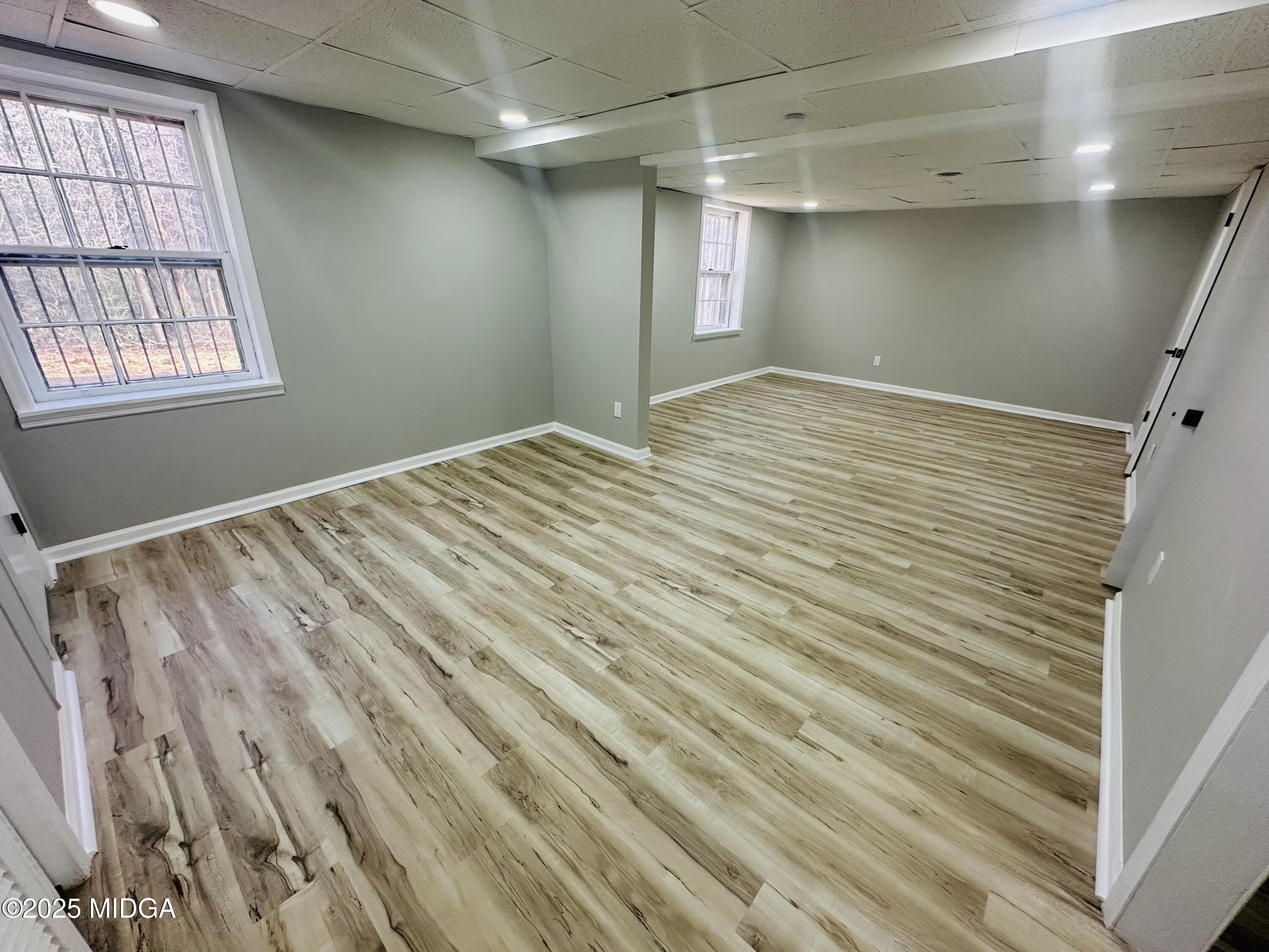 4105 Holley Road Lizella, GA 31052 - Photo 55 of 78 a view of empty room with wooden floor