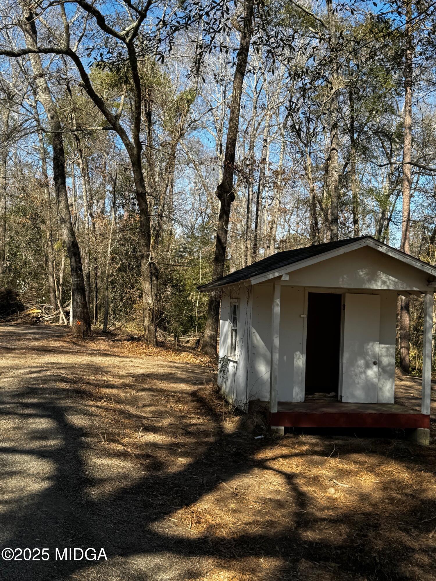 4105 Holley Road Lizella, GA 31052 - Photo 75 of 78 a view of a house with a yard
