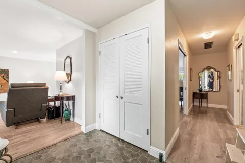 a bedroom with a bed and a view of bathroom