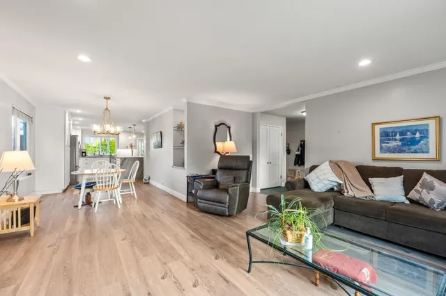 a backyard of a house with yard and outdoor seating