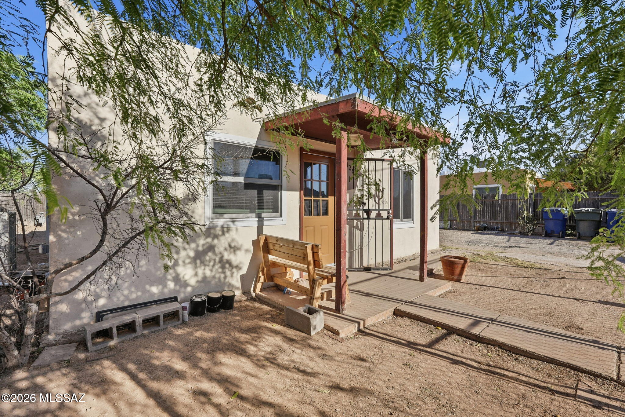 426 East Aragon Road, Unit 1 Tucson, AZ 85756 - Photo 2 of 18 a bench is sitting in front of a building
