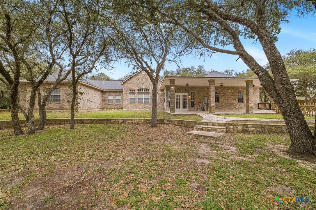 233 Post Oak Bend Inez, TX 77968 - Photo 3 of 45 a house with trees in front of it