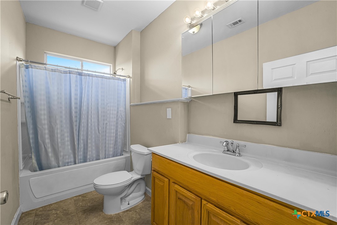 233 Post Oak Bend Inez, TX 77968 - Photo 38 of 45 a bathroom with a sink toilet and shower
