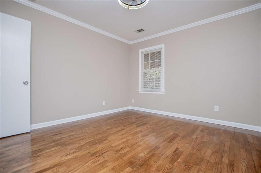 388 Macland Road Dallas, GA 30132 - Photo 36 of 52 an empty room with wooden floor and windows