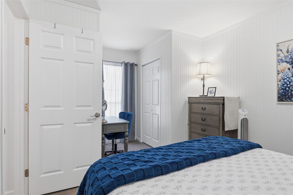 105 Cheyenne Trail Gilmer, TX 75644 - Photo 21 of 35 a bedroom with a bed and a dresser