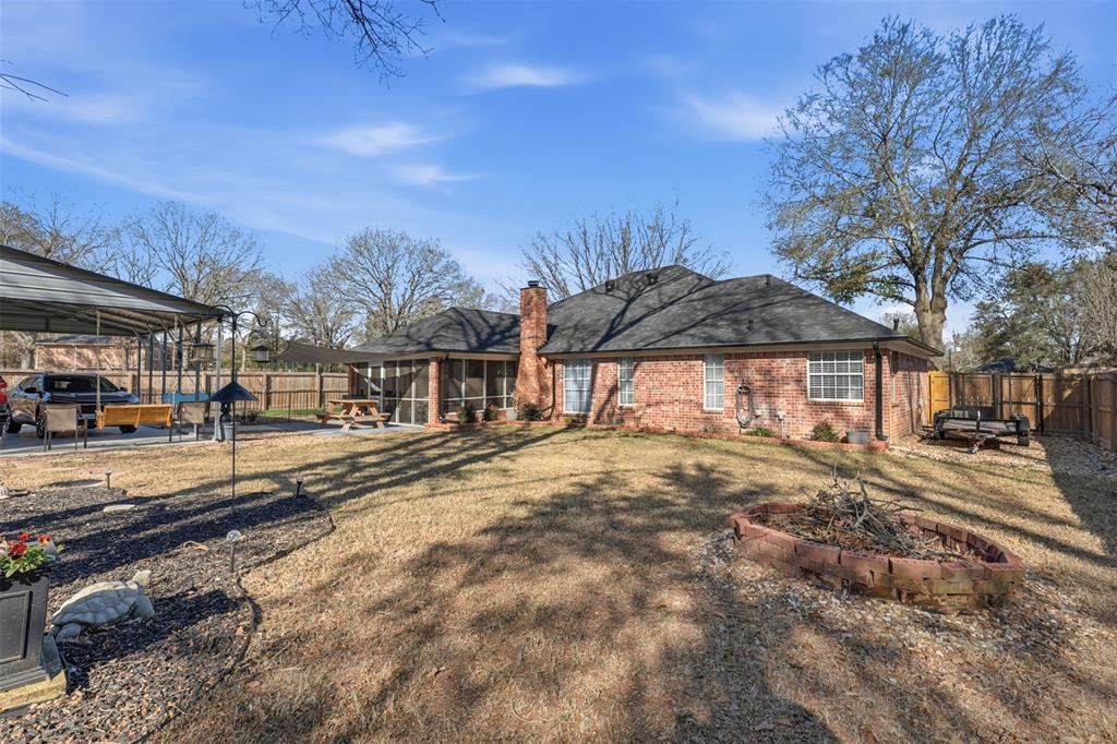 105 Cheyenne Trail Gilmer, TX 75644 - Photo 26 of 35 a view of a yard in front of a house