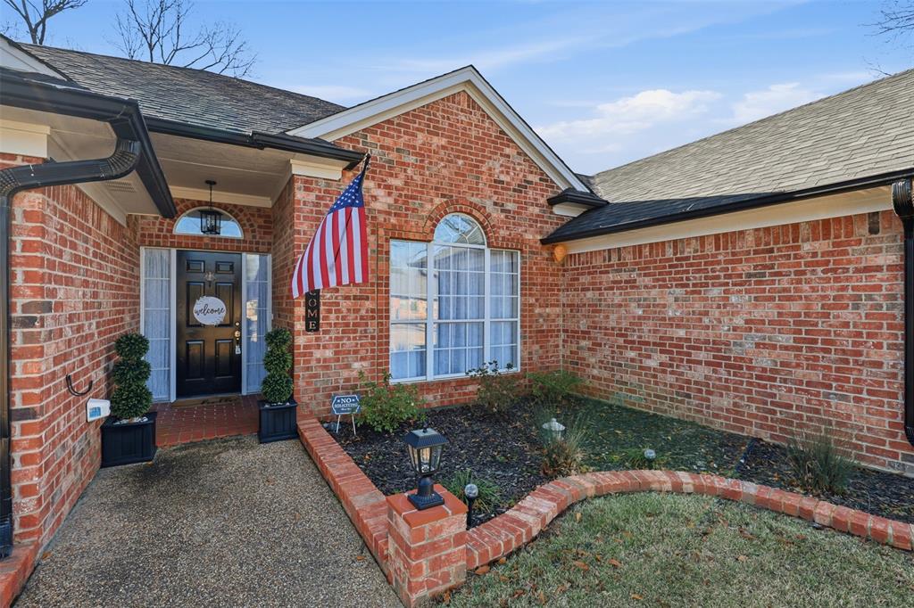 105 Cheyenne Trail Gilmer, TX 75644 - Photo 31 of 35 a view of a entrance gate of the house