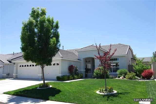 1772 Arrow Wood Court Reno, NV 89521 - Photo 1 of 1 a front view of a house with garden and trees