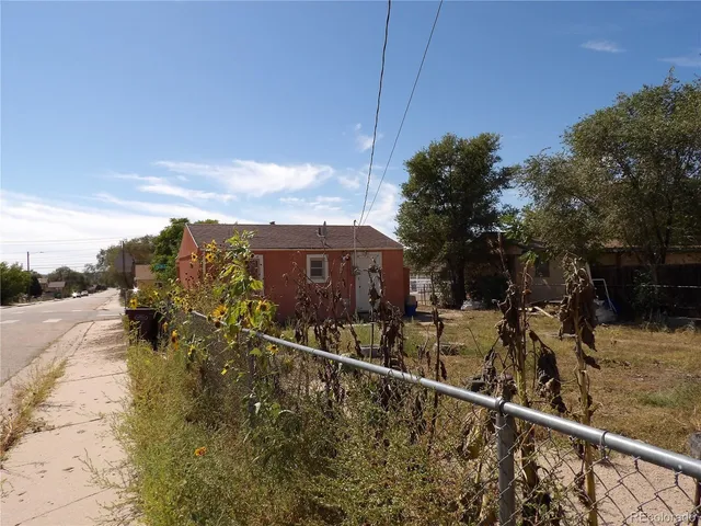 a view of a house with a large window