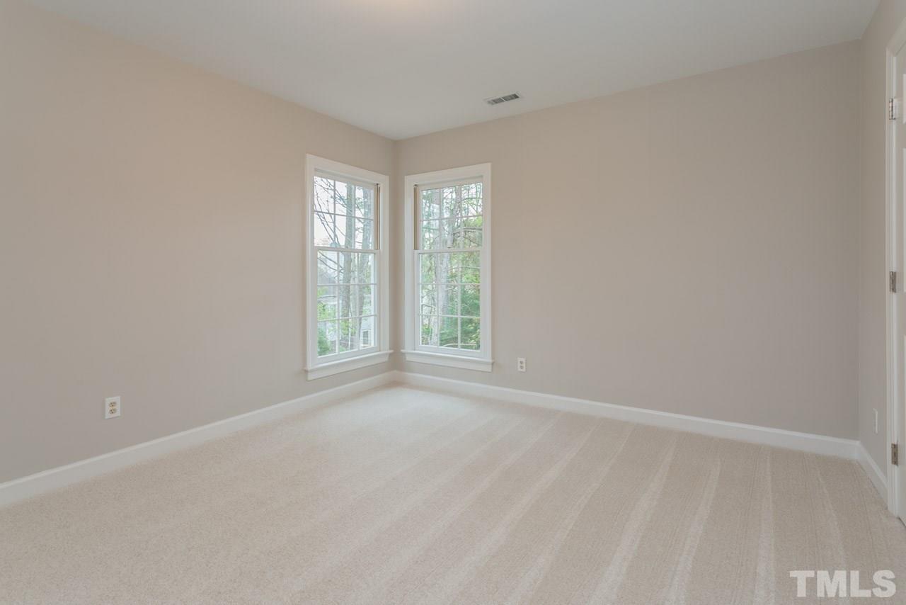 5505 Raddington Street Raleigh, NC 27613 - Photo 15 of 25 a view of an empty room with a window