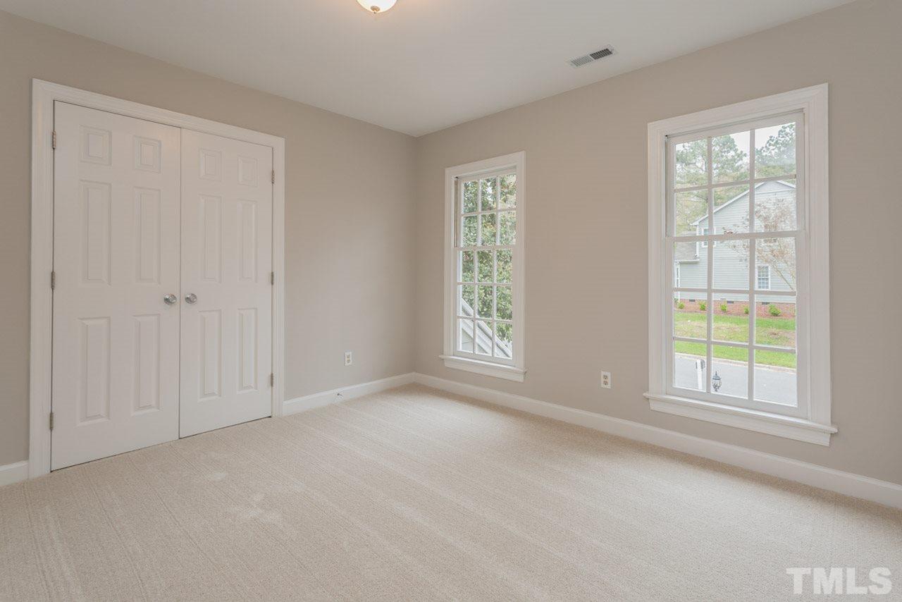 5505 Raddington Street Raleigh, NC 27613 - Photo 16 of 25 an empty room with windows