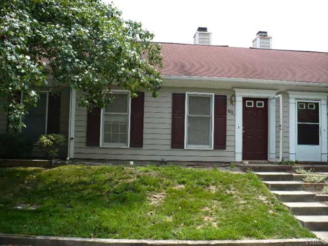 8226 Merriweather Circle Raleigh, NC 27616 - Photo 1 of 3 a front view of a house with garden