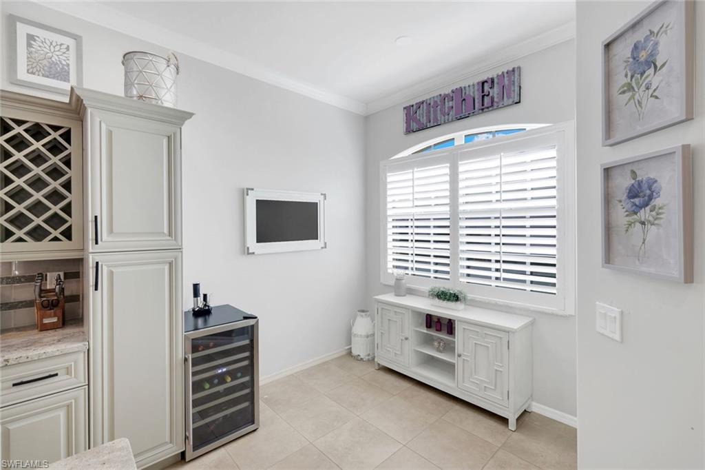 12694 Fox Ridge Drive Bonita Springs, FL 34135 - Photo 12 of 35 a room with window and dresser