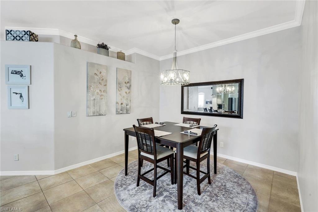 12694 Fox Ridge Drive Bonita Springs, FL 34135 - Photo 15 of 35 a view of a dining room with furniture