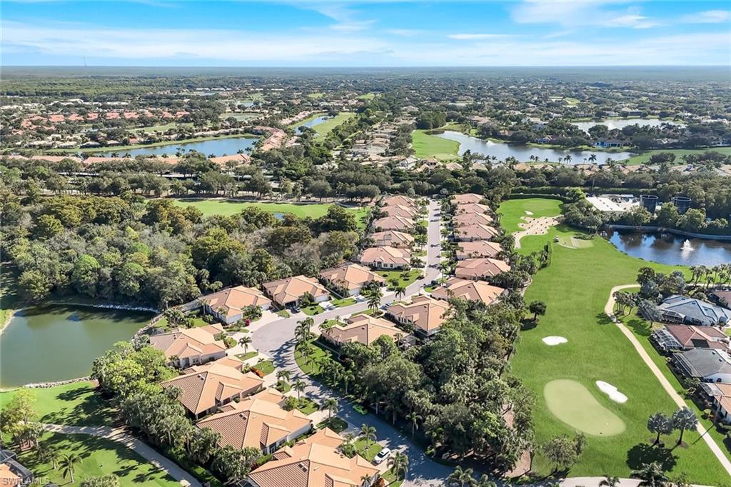 12694 Fox Ridge Drive Bonita Springs, FL 34135 - Photo 35 of 35 an aerial view of a city with lots of residential buildings lake and ocean view