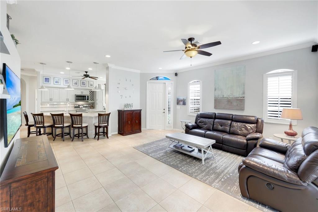 12694 Fox Ridge Drive Bonita Springs, FL 34135 - Photo 6 of 35 a living room with furniture and kitchen view