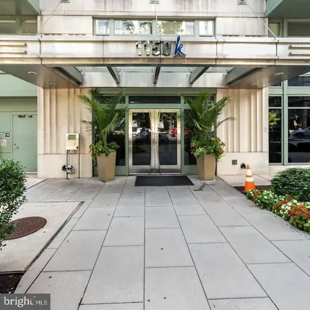 a view of a entryway with flower pots