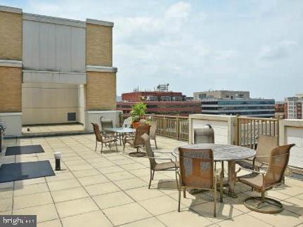 1150 K Street Northwest, Unit 506 Washington, DC 20005 - Photo 13 of 14 a view of a terrace with chairs