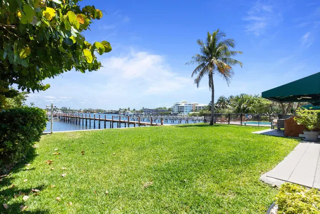 a view of a garden with a house