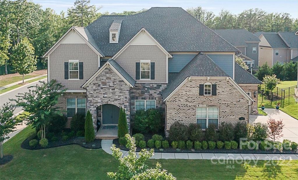 7001 Fallondale Road Waxhaw, NC 28173 - Photo 1 of 32 a aerial view of a house with a yard