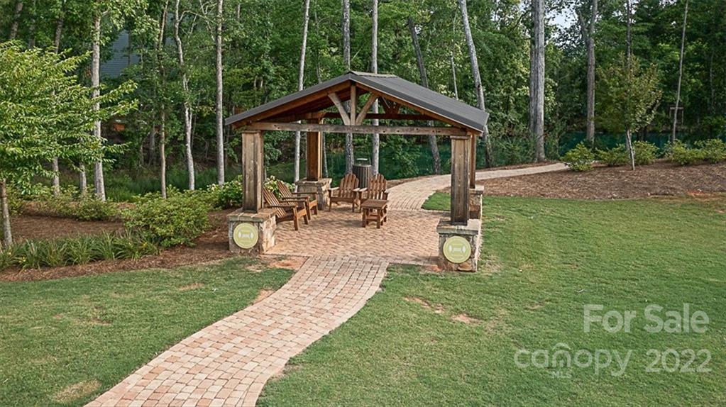 7001 Fallondale Road Waxhaw, NC 28173 - Photo 30 of 32 a view of a patio with a yard