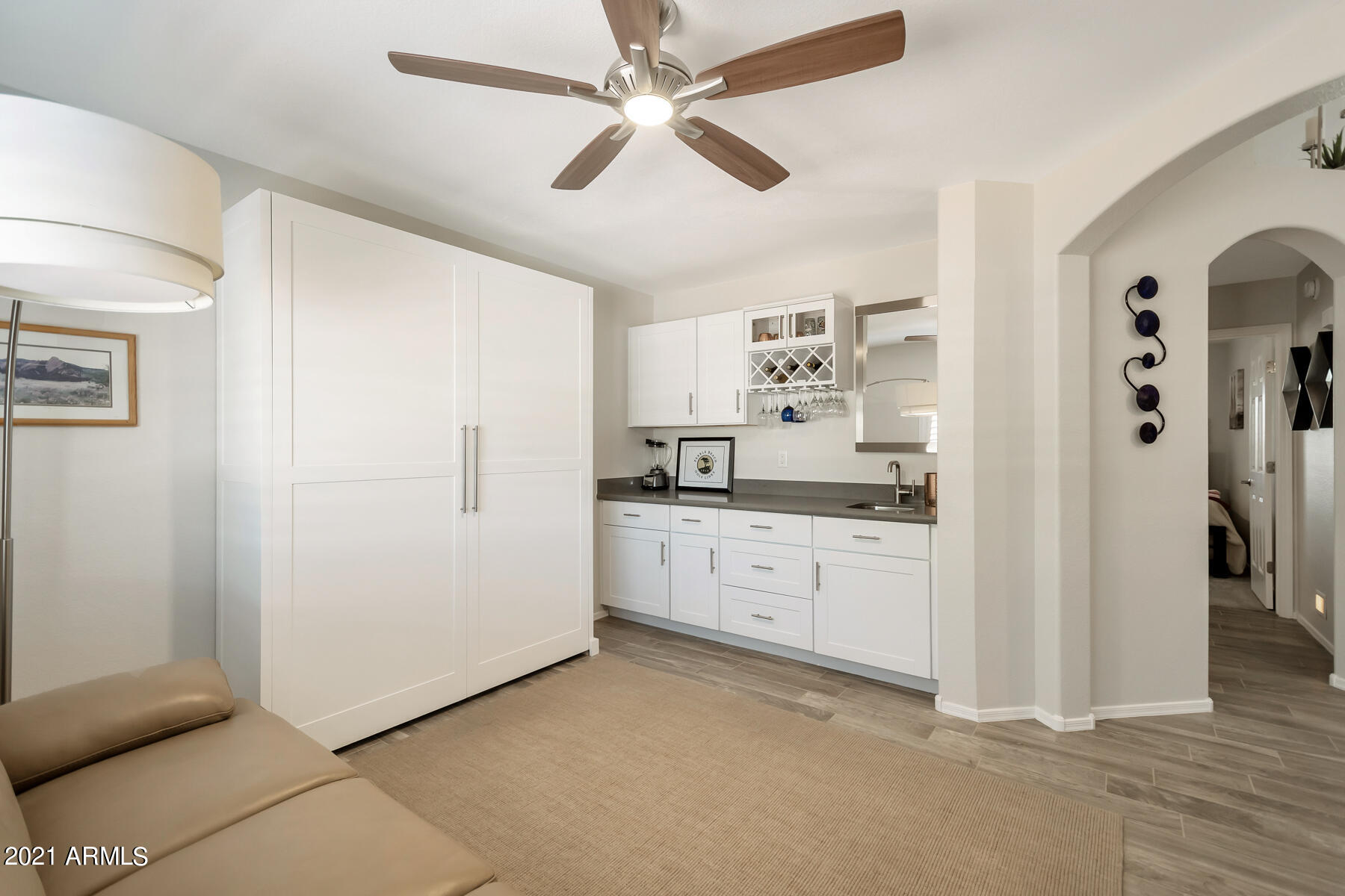 15391 Piccadilly Road Goodyear, AZ 85395 - Photo 21 of 30 Den/office with wet bar