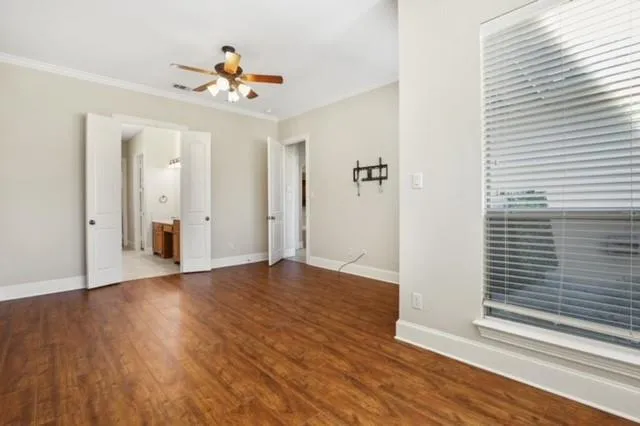 a view of a livingroom with wooden floor
