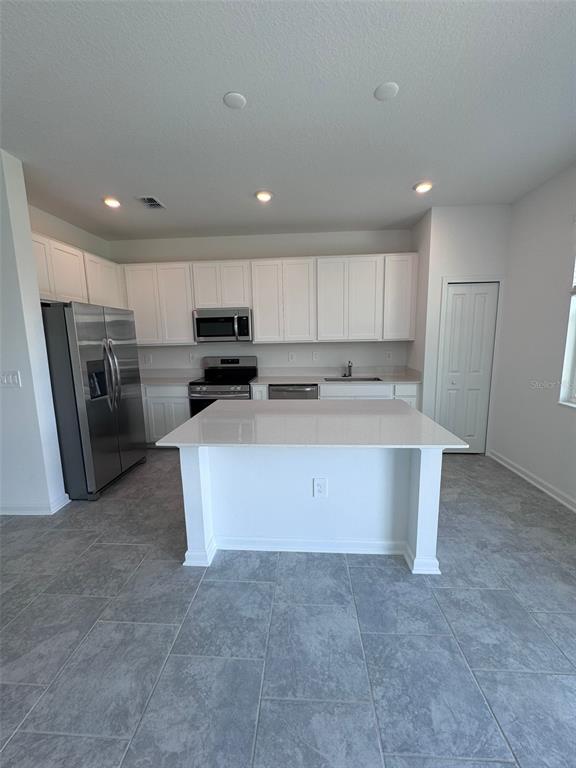 3133 Laurent Loop Davenport, FL 33837 - Photo 4 of 35 Gallery Image 4