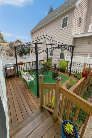 a view of a chairs on the deck
