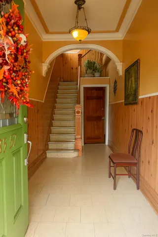 a view of entryway with a front door
